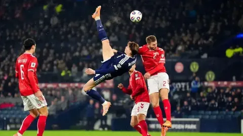 “椰韵光影：盛事落幕，新华社捕捉体育盛宴精彩瞬间”